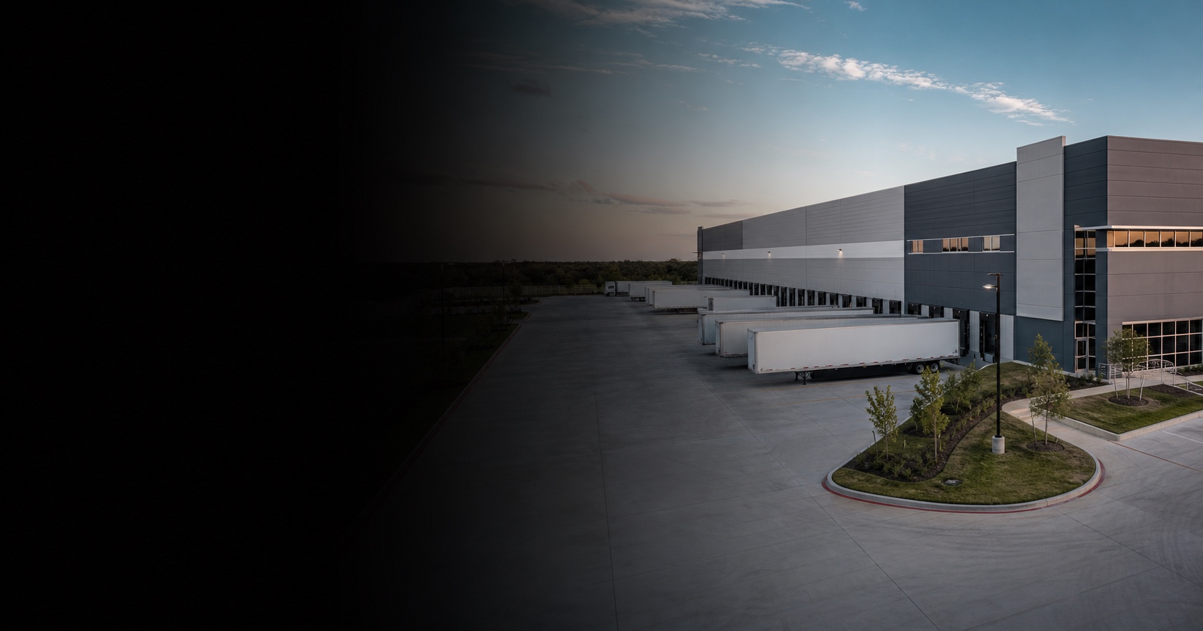 Modern industrial distribution facility with tractor trailers